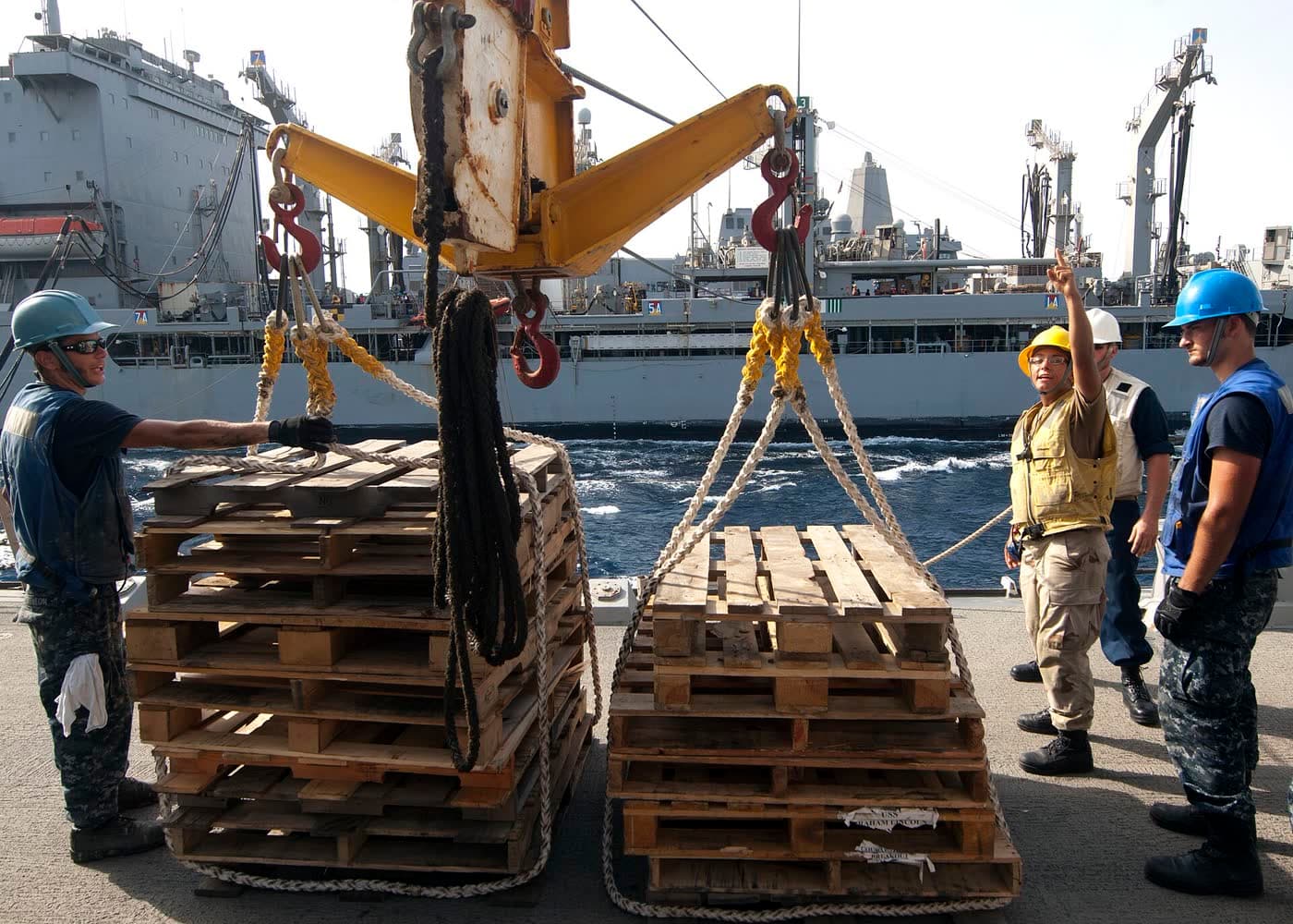 Mobile crane hook block suspended from boom